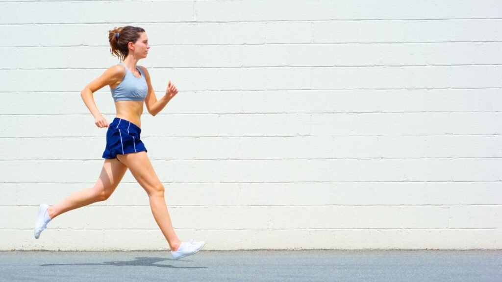 Women running exercise for physical grounding to restore mental clarity
