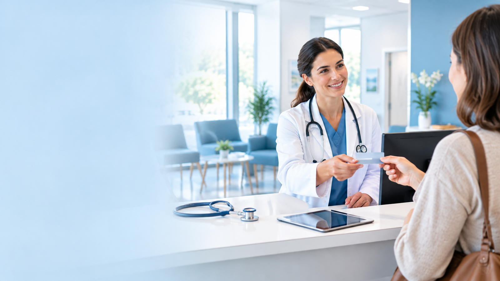 Doctor greeting a patient at a clinic reception desk in Germany as an insurance card is handed over